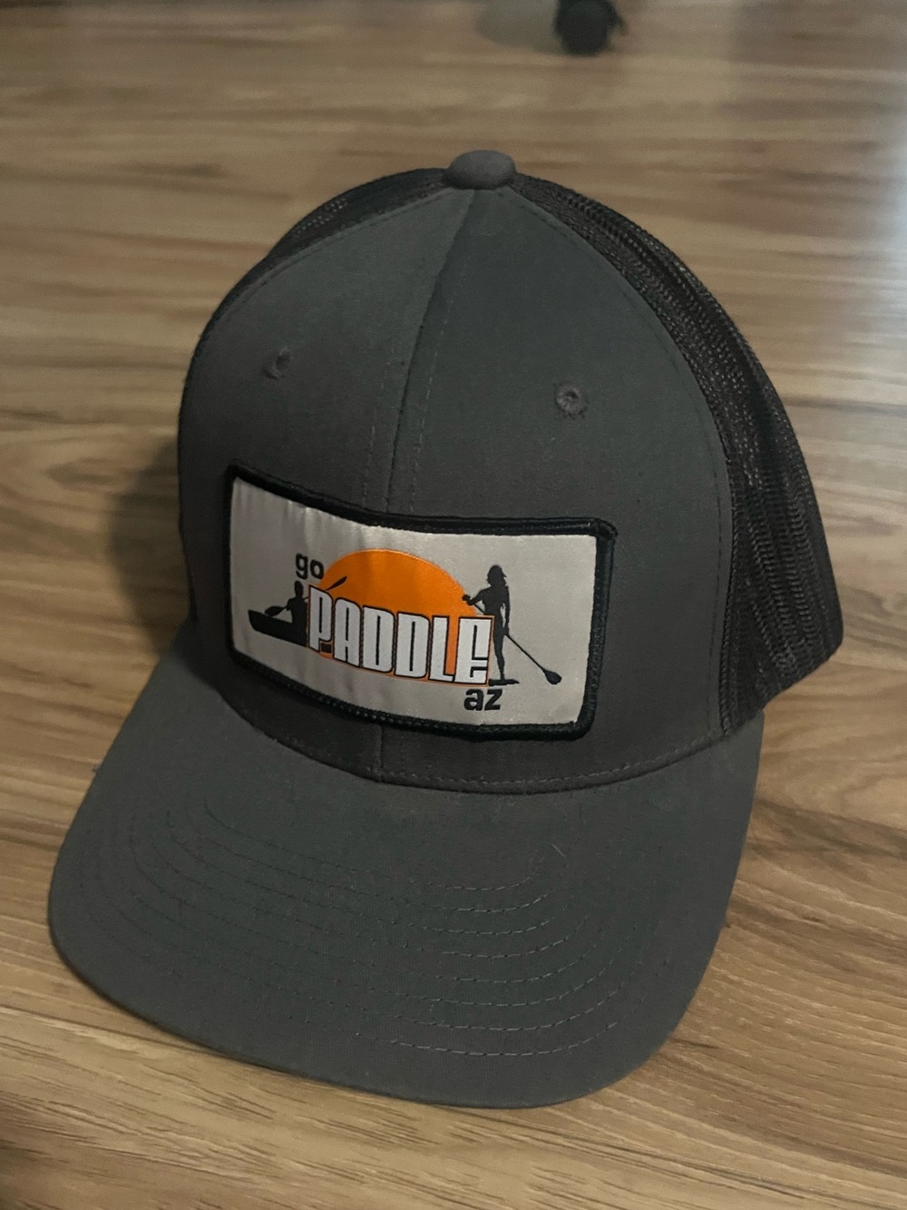 Go Paddle AZ Trucker Hat in Charcoal with Orange Patch